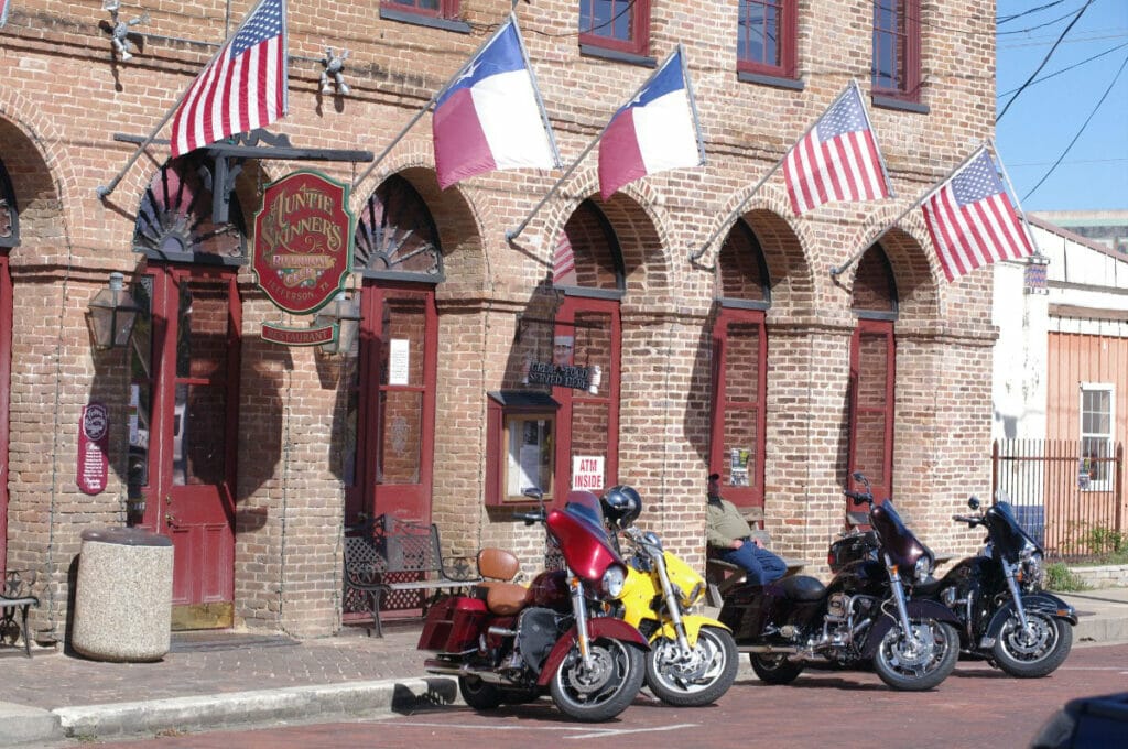 Image of motorcycles parked outside a bar in Jefferson Texas