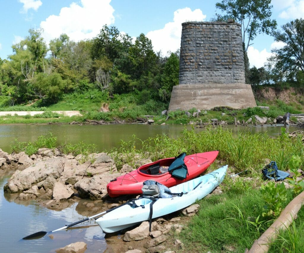 Kayaks laying on the bank at Old Brazos River in Freeport, Texas