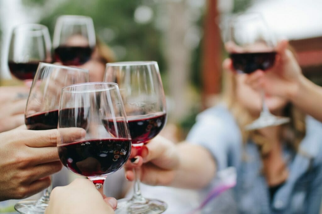 People drinking red wine 