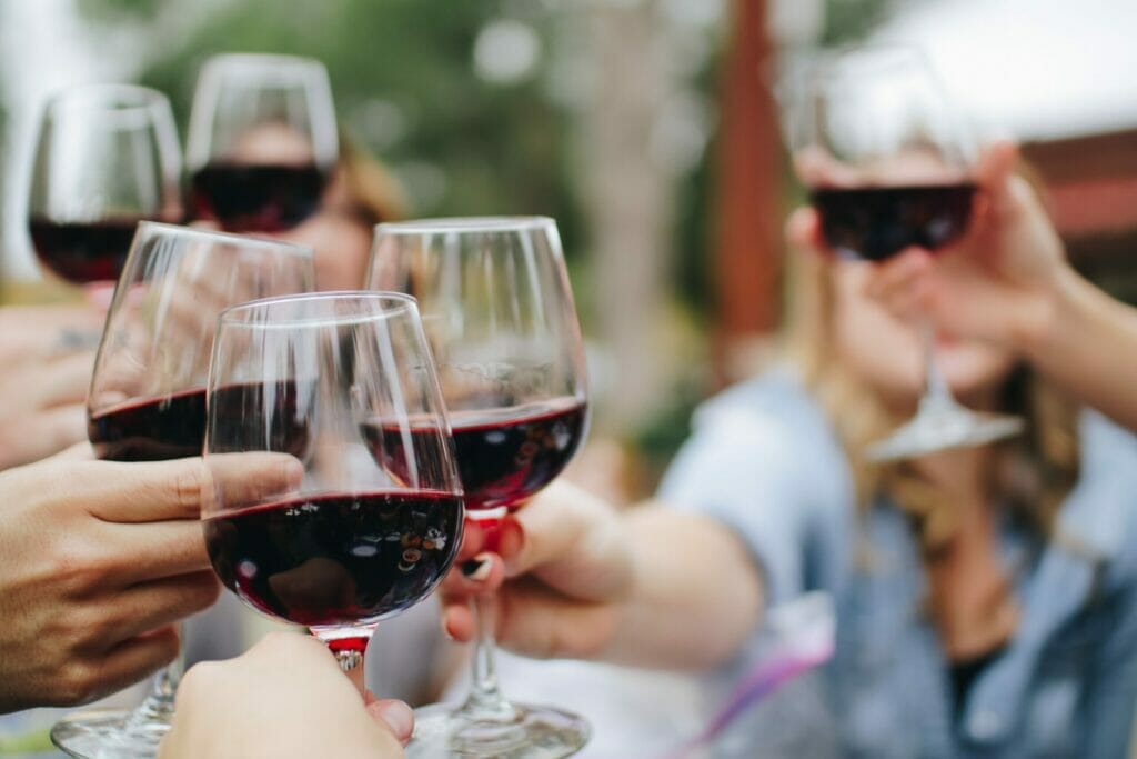 People enjoying red wine 