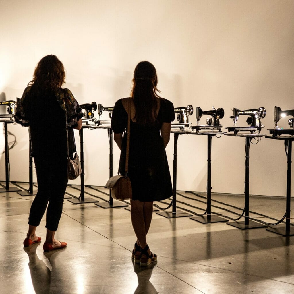 People observing art at Wonderspaces in Austin Texas