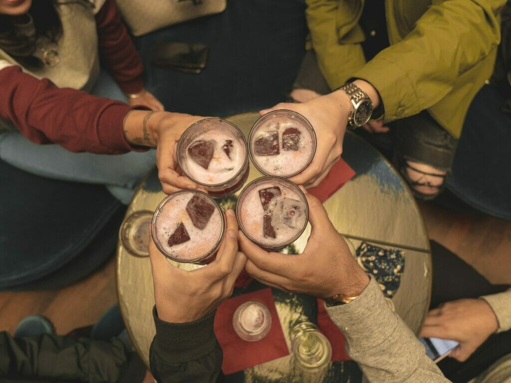 People drinking at a speakeasy