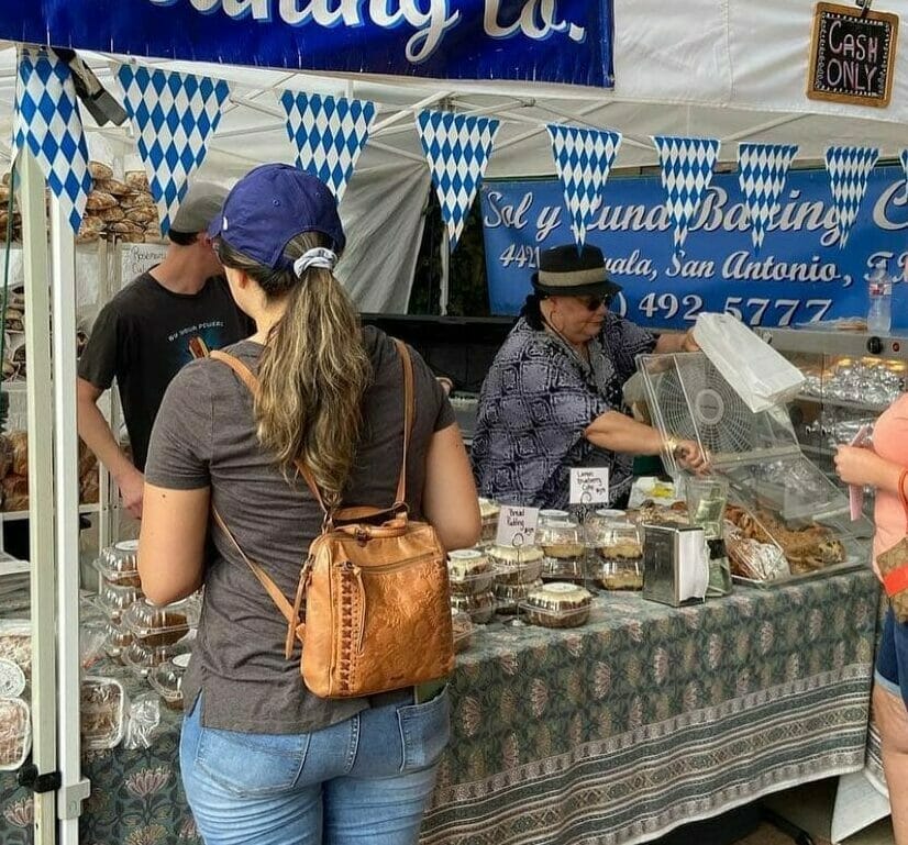 Girl ordering food at Pearls Farmers Market 