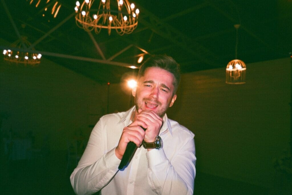 Man singing at a karaoke bar