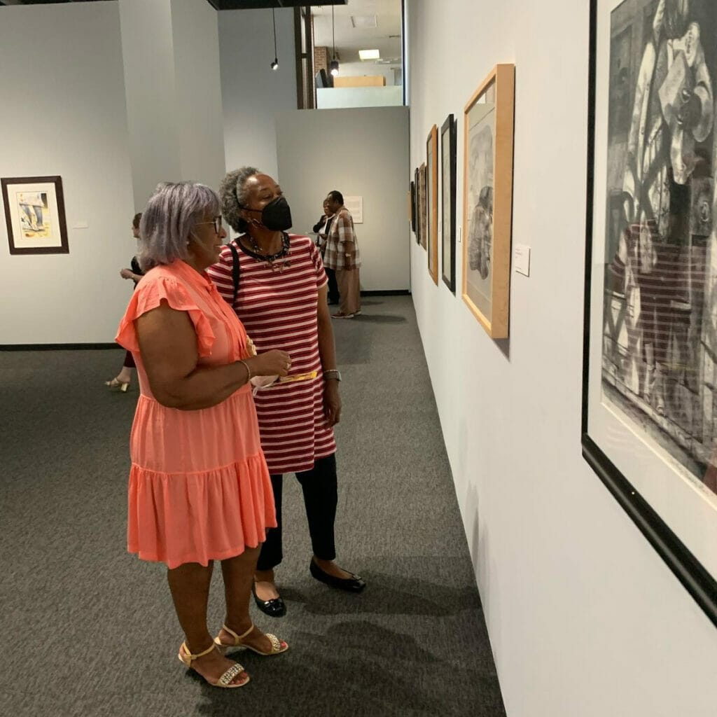 People enjoying art at the Tyler Museum of Art 