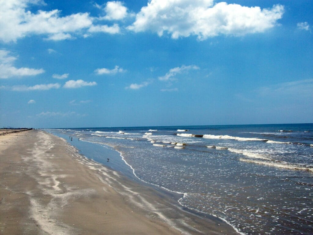 Waves crashing at Surfside beach in Texas