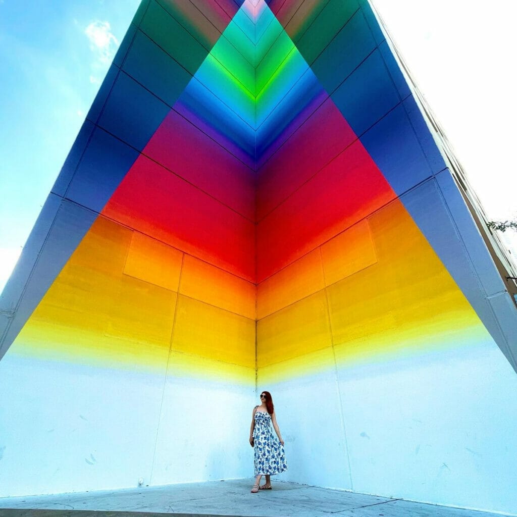 Woman standing in front of Tau Ceti structure in Austin 