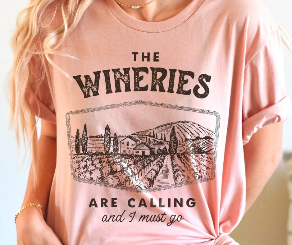Woman wearing pink winery Etsy shirt 