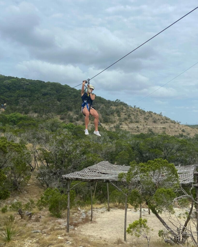 Woman ziplining in Canyon Lake 